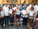 Abinader entrega 1,279 títulos de propiedad en Haina