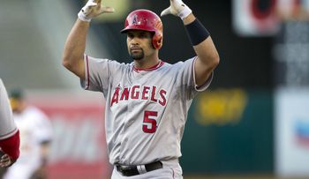Pujols dispara su jonrón número 590 