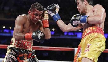 Golovkin retiene título al vencer a Jacobs; victoria â??mostrencaâ? para Sor Rungvisa ante Chocolatito