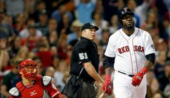 Angelinos y Boston dividen honores en el Fenway