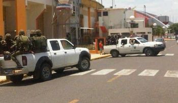 Detienen dos hombres en Santiago con 6 granadas y 4 fusiles