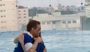 Diandino Peña y su esposa se bautizan en las alturas de RD