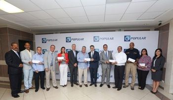 Banco Popular aporta RD$10 millones a afectados por lluvias en zona norte