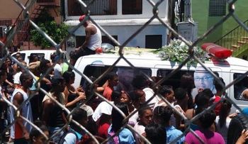 Sepultan joven que fue ultimado el sábado por la Policía en sector La 40