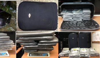 DNCD y CESAC ocupan 32.3 kilos de cocaína en dos maletas en el AILA
