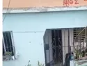 Aguas negras inundan vivienda en La Ciénaga y afectan la salud de una residente