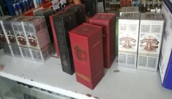 MP y Policía arrestan dos hombres vinculados a contrabando de bebidas alcohólicas y cigarrillos  