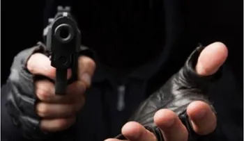 Un muerto y dos mujeres heridas en asalto a banca de lotería en La Vega