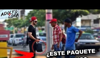 Entregando 50 mil dólares a desconocidos en calles de RD (VIDEO)