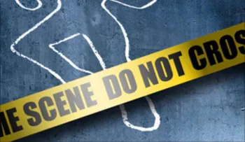 Hallan hombre muerto a tiros en un solar de Santiago