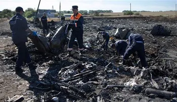 Transportan a Holanda a víctimas de avión malasio 