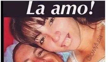 La amo