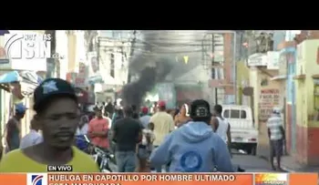 Huelga en Capotillo por muerte de joven alegadamente por agentes DNCD  (VIDEO)