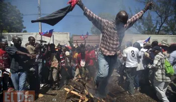 Haití: multitudes marcan aniversario de golpe 