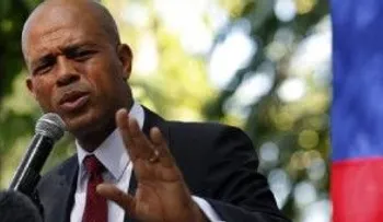 Presidente Martelly lanza canción grosera contra una periodista