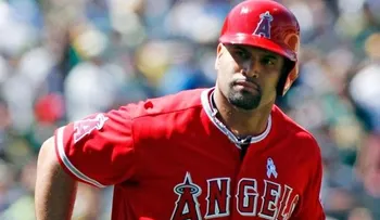 Pujols dispara su cuadrangular 21 y Peralta da el 11