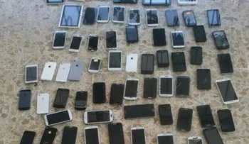 Autoridades allanan 2 establecimientos de venta de celulares en el DN