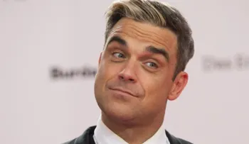 Robbie Williams: "Me volví un neurótico con mi lugar en las listas de ventas"