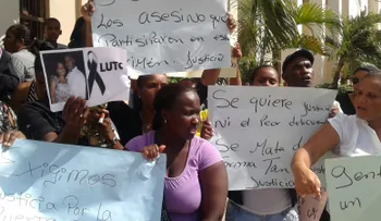 Aplazan coerción contra 24 policías por asesinato de pareja en San Cristóbal