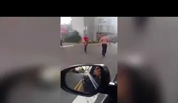 La '"esposa kung-fu" evita que su marido sea acuchillado (VIDEO)