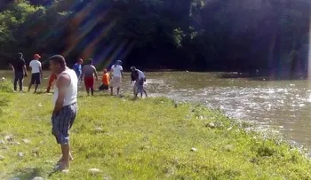 Hallan cadáver de hombre se ahogó junto a 2 hijos en río Yaque del Norte