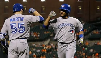 Encarnación pegó dos jonrones y Toronto castigó a los Orioles