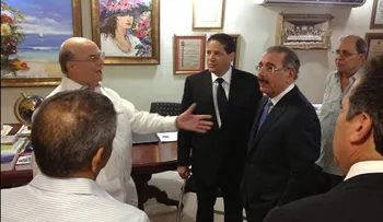 Defensores de haitianos van donde el presidente Medina, quien les promete consultar decisión del TC
