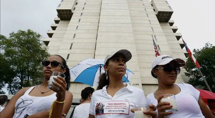 Oran por dominicana acusada de matar a esposa de exjuez en Puerto Rico