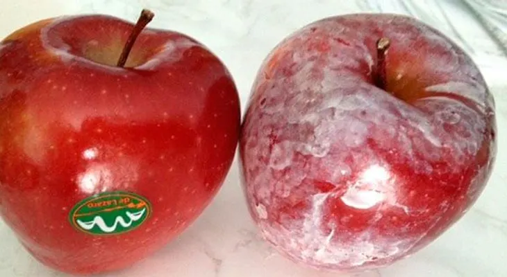 Moja con agua caliente tus manzanas, y ve si esta cera cancerígena aparece