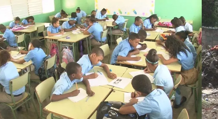 No es un vertedero, es la parte trasera de una escuela en La Romana