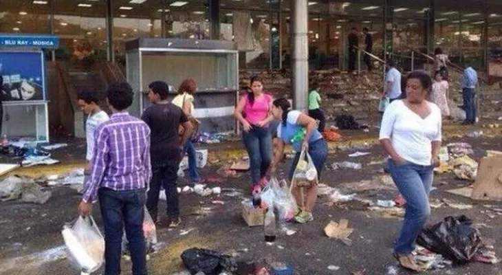 Grupos saquean comercios en Venezuela