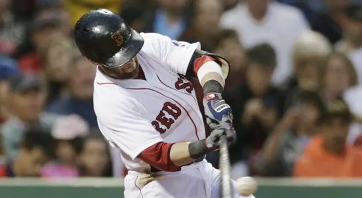 Lester y Pedroia guían victoria de Medias Rojas sobre Toronto