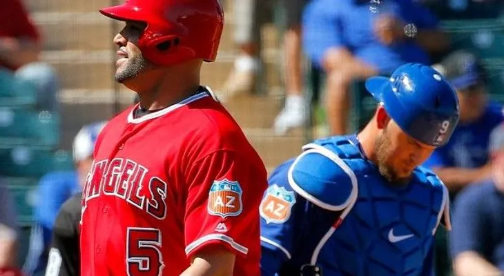 Nova lanzó bien, Machado la sacó y Pujols remolcó dos