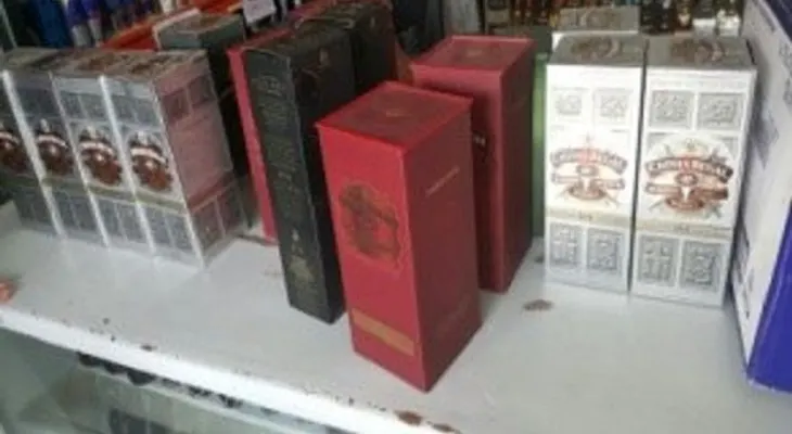 MP y Policía arrestan dos hombres vinculados a contrabando de bebidas alcohólicas y cigarrillos  