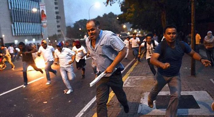 Suben a 13 muertos en calles Venezuela