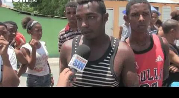 Intentan linchar una mujer por haberse  "chupado" un niño en Azua