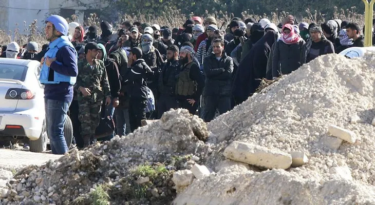 Evacuan civiles y combatientes de la ciudad siria de Homs
