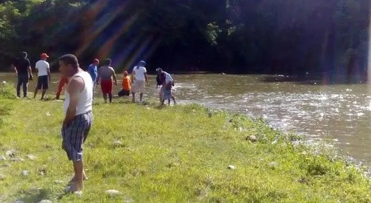 Buscan tres personas que desaparecieron en balneario del río Yaque