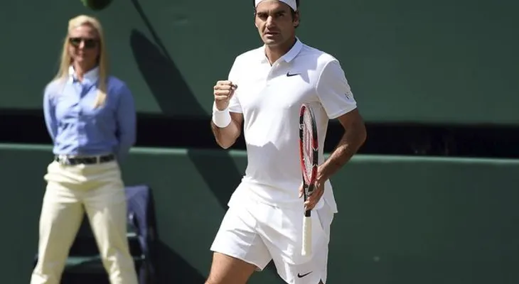 Federer se mantiene en la lucha hacia su 18 Grandre
