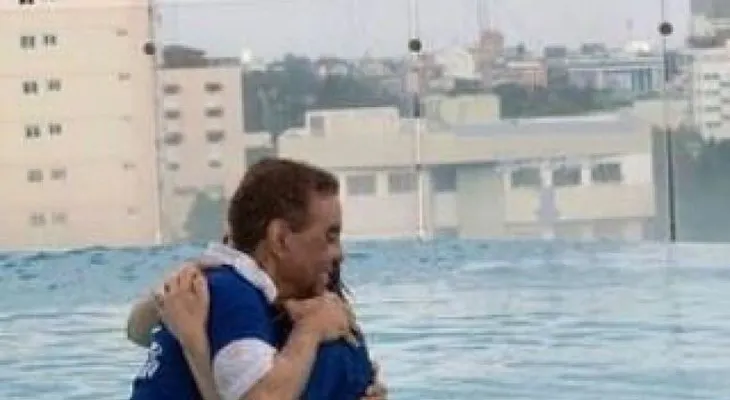 Diandino Peña y su esposa se bautizan en las alturas de RD
