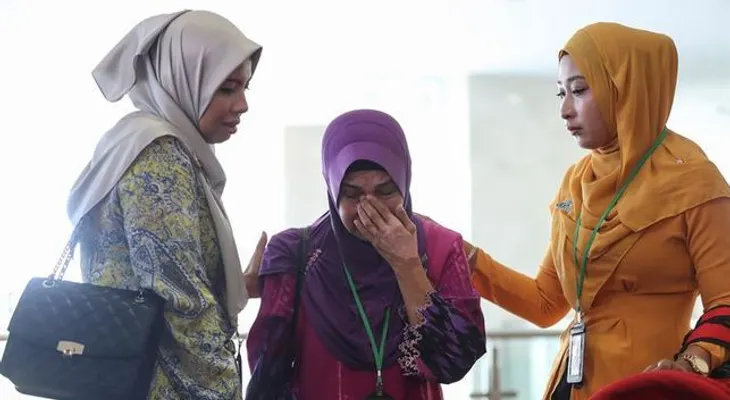 Familiares chinos del MH370 rechazan el informe malasio sobre la desaparición