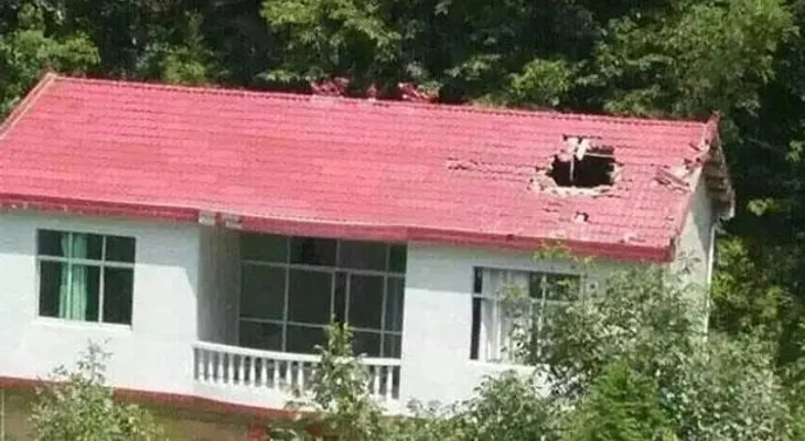 Los restos de un cohete espacial caen sobre una vivienda china