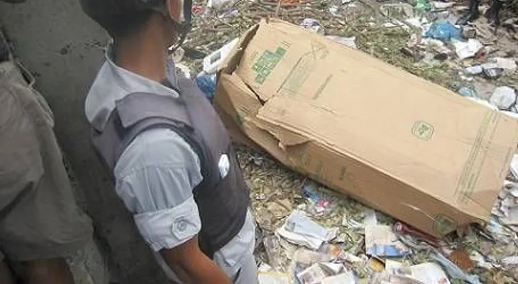 Encuentran mujer muerta en caja de cartón cerca mercado de SPM