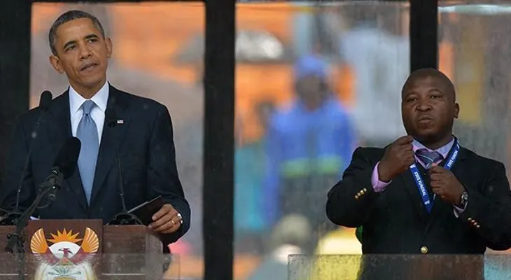 Intérprete del funeral de Mandela quemó vivos a 2 ladrones