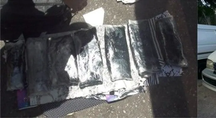 Apresan venezolano y dominicano con 7 paquetes presumiblemente de cocaína en un hotel del Malecón
