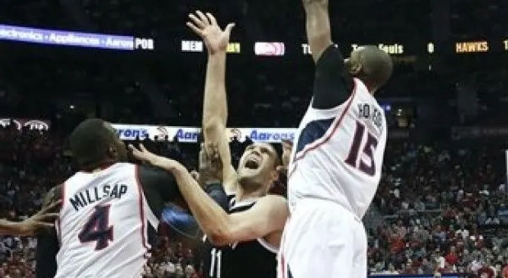 Paul Millsap y Al Horford ayudan a los Hawks a contener a los Nets 