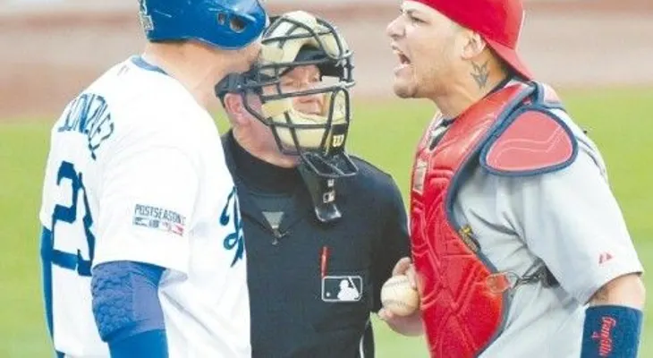 Carpenter  y Holliday guían a los Cardenales; SF también ganó