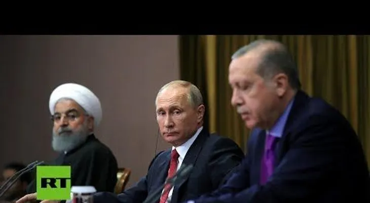 Putin hace algo extraño con la silla de Erdogan en encuentro Rusia, Irán y Turquía 
