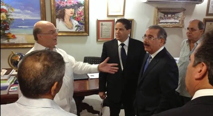 Defensores de haitianos van donde el presidente Medina, quien les promete consultar decisión del TC